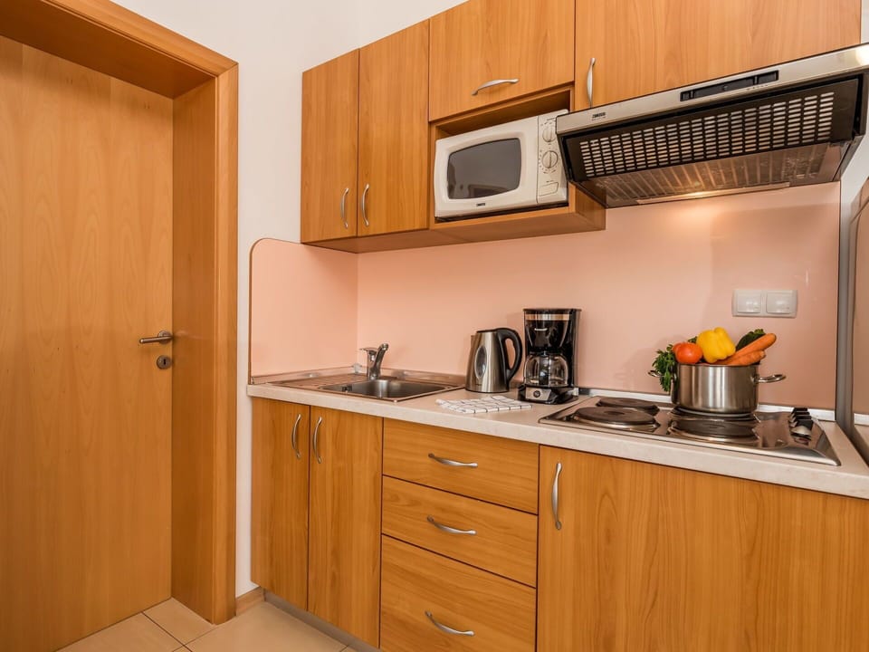 Cabinetry, Room, Countertop, Property, Kitchen, Furniture, Interior Design, Yellow, Building, House