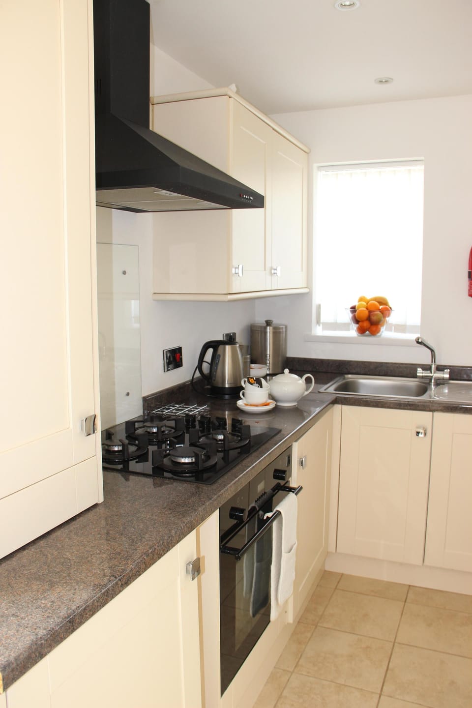 Well equipped kitchen opening onto the lounge. 