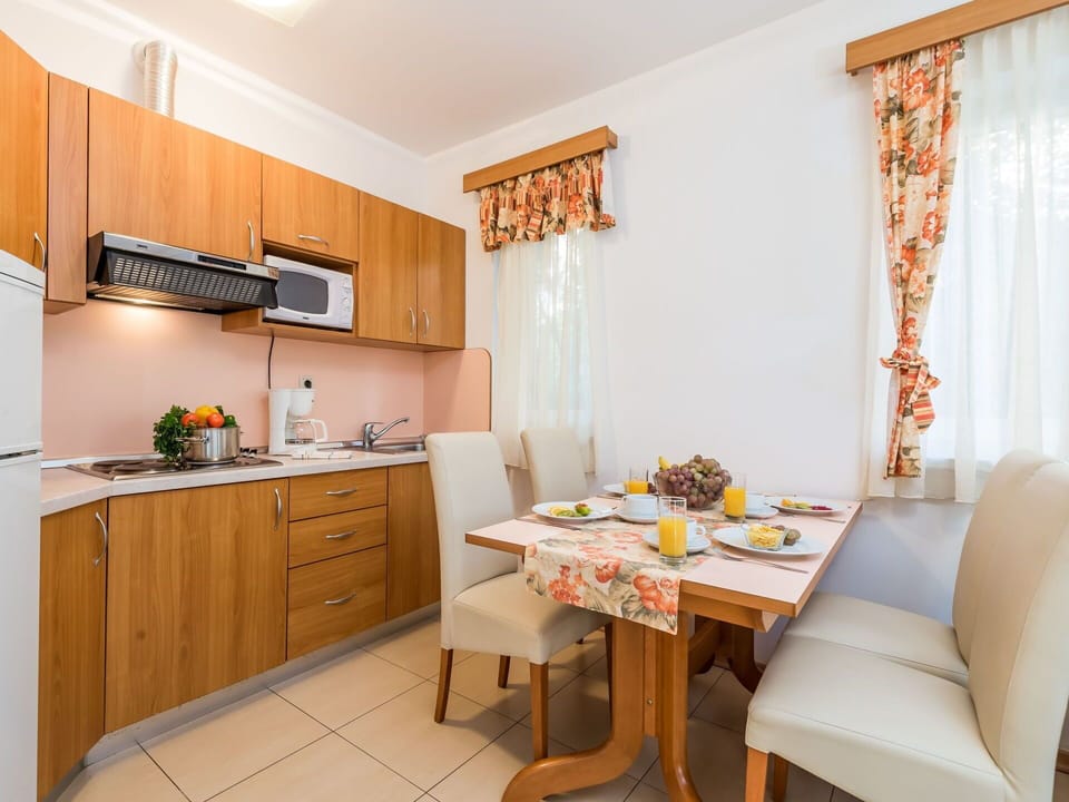 Room, Furniture, Property, Interior Design, Building, Yellow, Kitchen, House, Floor, Table