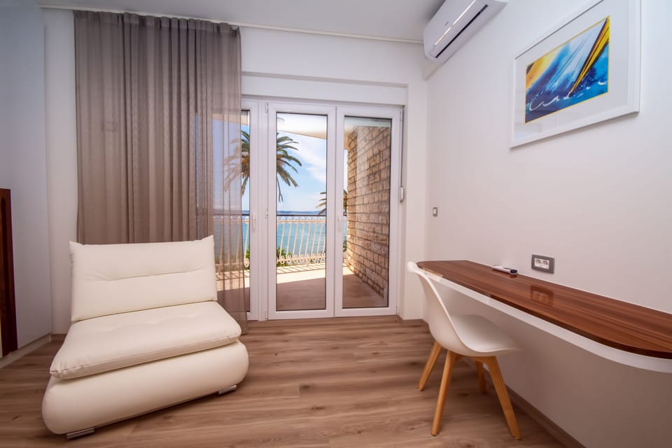 Bedroom No1 with double bed, sofa bed, balcony, ensuite bathroom