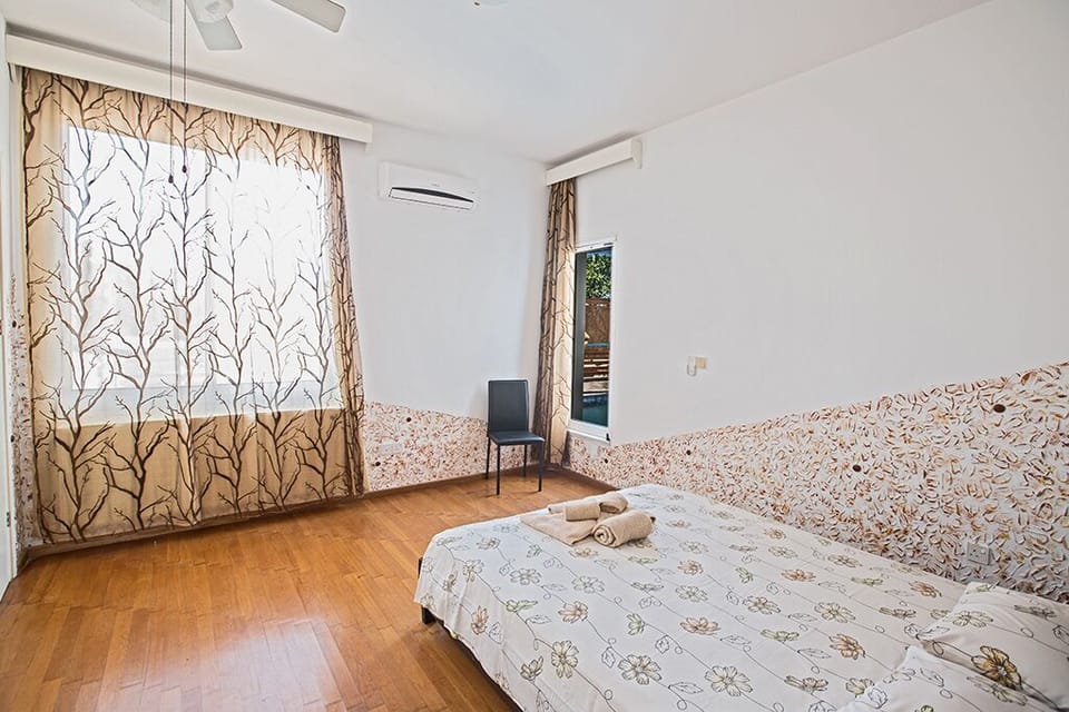 Master Bedroom with en suite bathroom and double bed