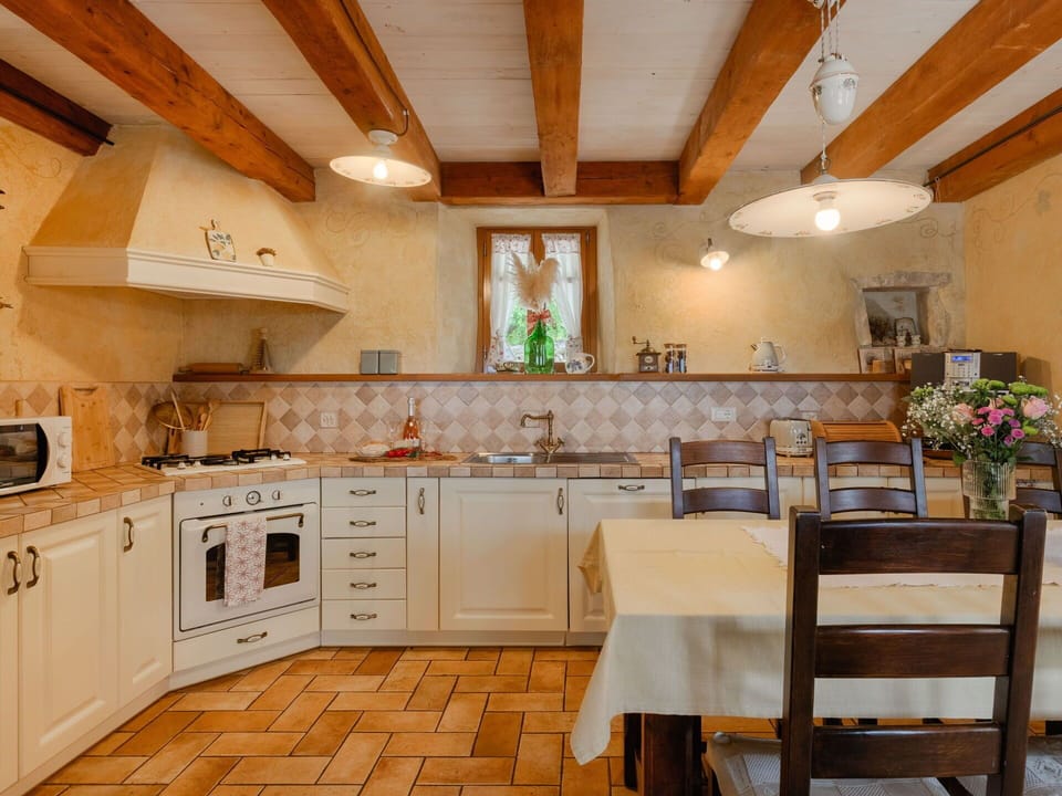 Furniture, Interior Design, Flooring, Kitchen, Countertop, Wood, Floor, Ceiling, Cabinetry, Room