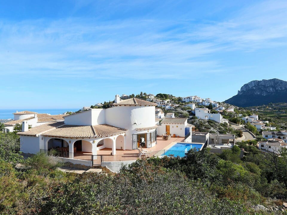 Cloud, Sky, Building, Property, Window, Blue, Tree, House, Mountain, Coastal And Oceanic Landforms