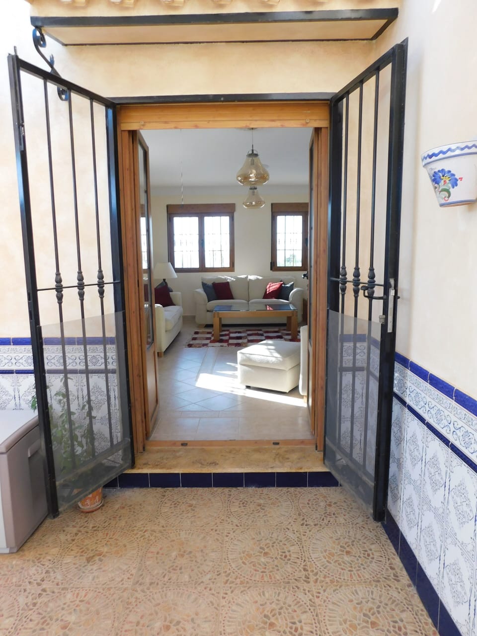 Doors from courtyard to lounge