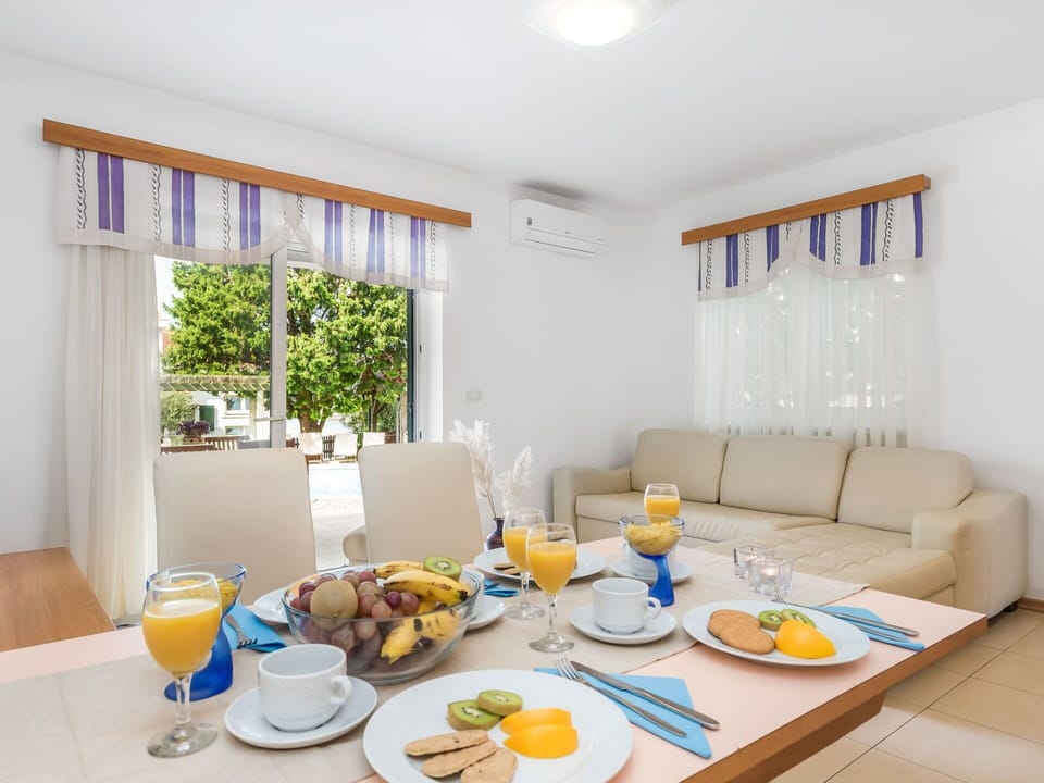 Room, Property, Yellow, Interior Design, Furniture, Blue, Table, Dining Room, Real Estate, Living Room