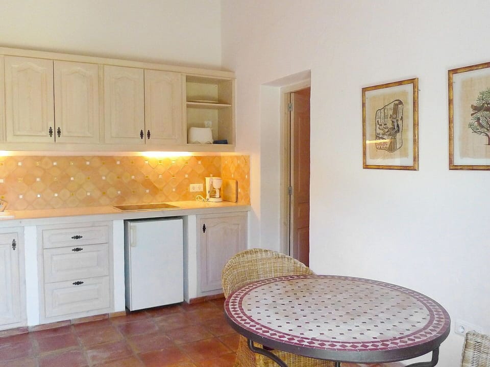 Furniture, Room, Property, Interior Design, Floor, Yellow, House, Building, Cabinetry, Table