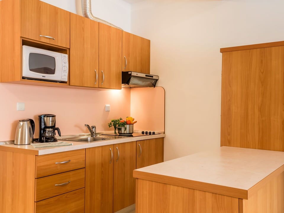 Cabinetry, Room, Kitchen, Furniture, Property, Countertop, Plywood, Interior Design, Yellow, House