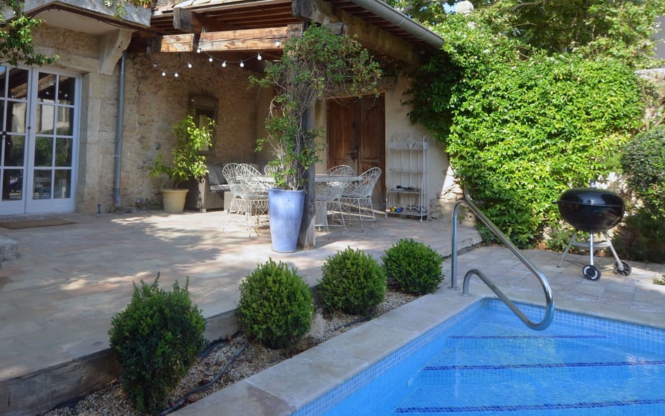 Evening lighting on terrace by pool