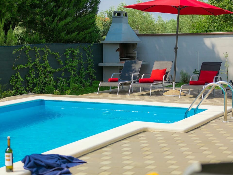 Water, Property, Furniture, Plant, Swimming Pool, Umbrella, Chair, Shade, Outdoor Furniture, Rectangle