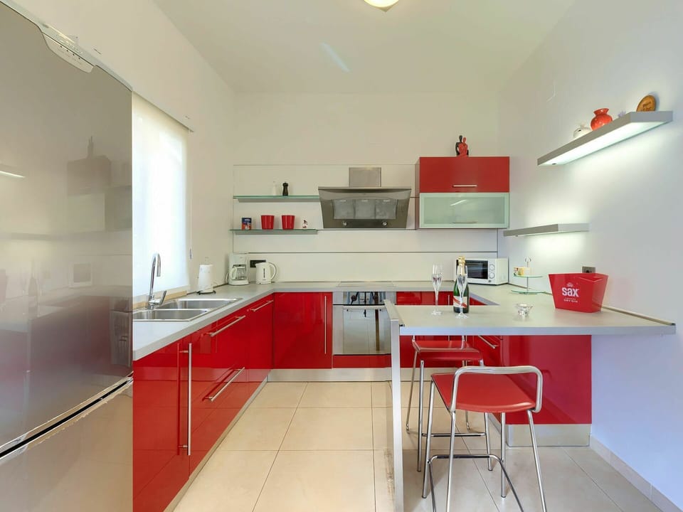 Tap, Cabinetry, Furniture, Kitchen Sink, Sink, Countertop, Kitchen Stove, Building, Plumbing Fixture, Kitchen