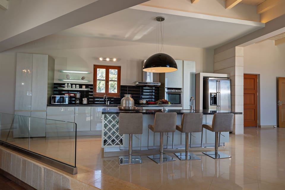 Fully equipped kitchen on the ground floor.