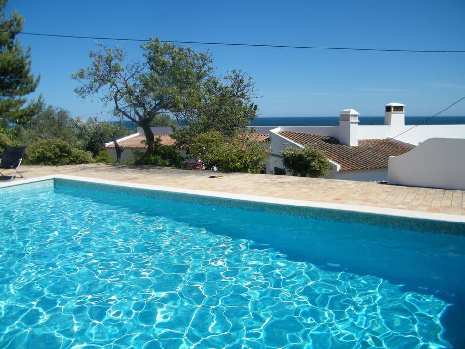 Private pool above the villa overlooking Meia Praia beach