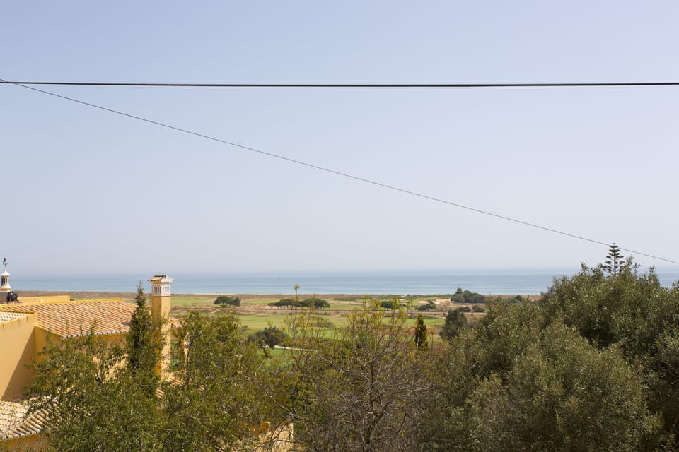 View from the house terrace overlooking part of the golf course and Meia Praia 