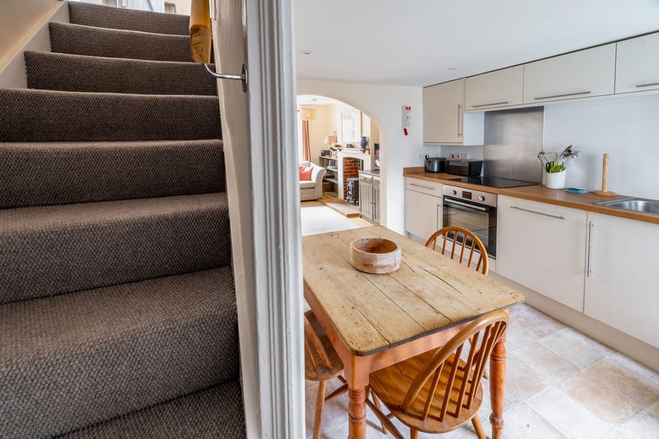 Ground floor: Staircase leading up stairs to the bedrooms