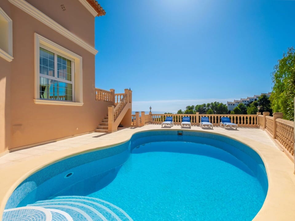 Water, Sky, Building, Swimming Pool, Azure, Window, Plant, Shade, Outdoor Furniture, Leisure