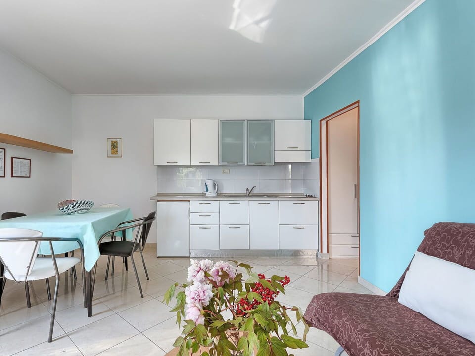 Room, Furniture, Property, Interior Design, Building, Floor, Table, Turquoise, House, Wall