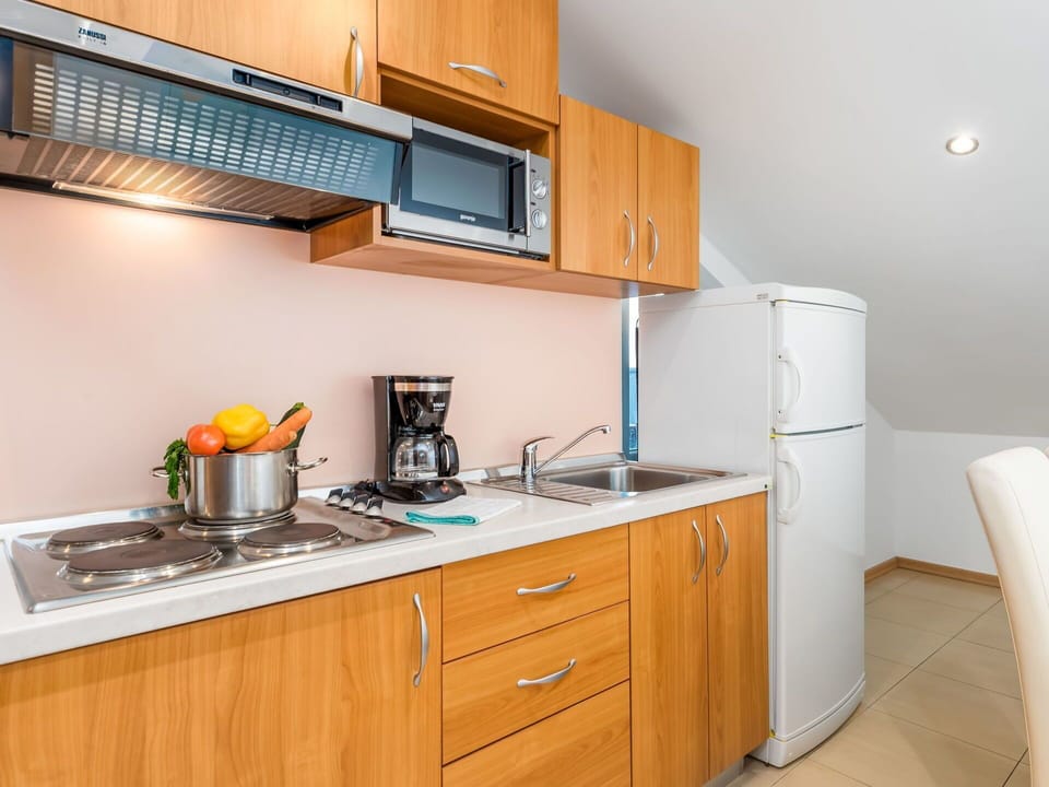 Room, Property, Cabinetry, Countertop, Kitchen, Furniture, Yellow, House, Building, Interior Design