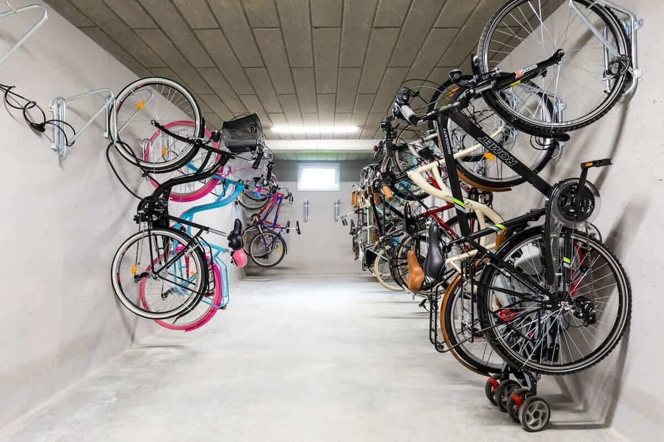 A dedicated indoor bike storage area with secure racks, providing convenient storage for residents.