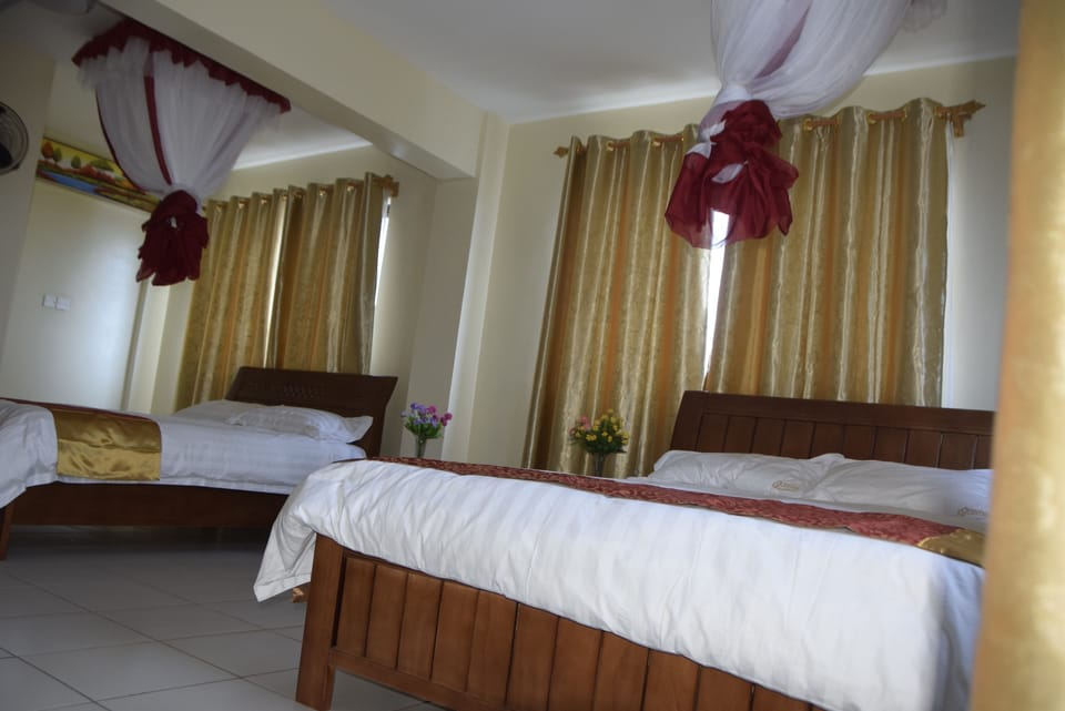 Executive Room, Multiple Beds, Non Smoking, City View (Family Room) | In-room safe, desk, iron/ironing board, cribs/infant beds