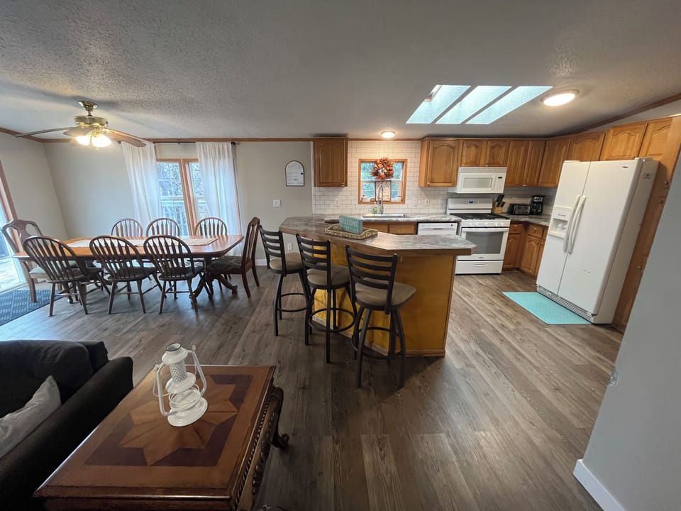 Kitchen, living, and dining.