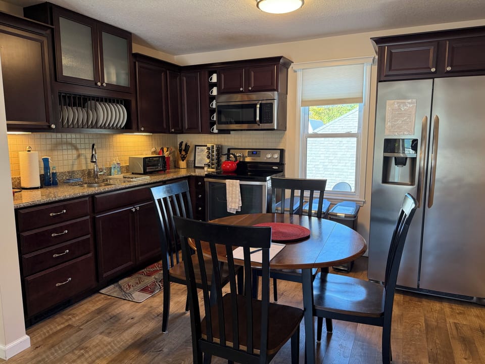 Dining area, table and four chairs

