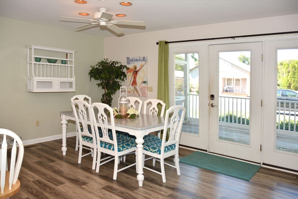Enter the great room from the porch! 
The dining area with breakfast bar in the kitchen provides seating for 10