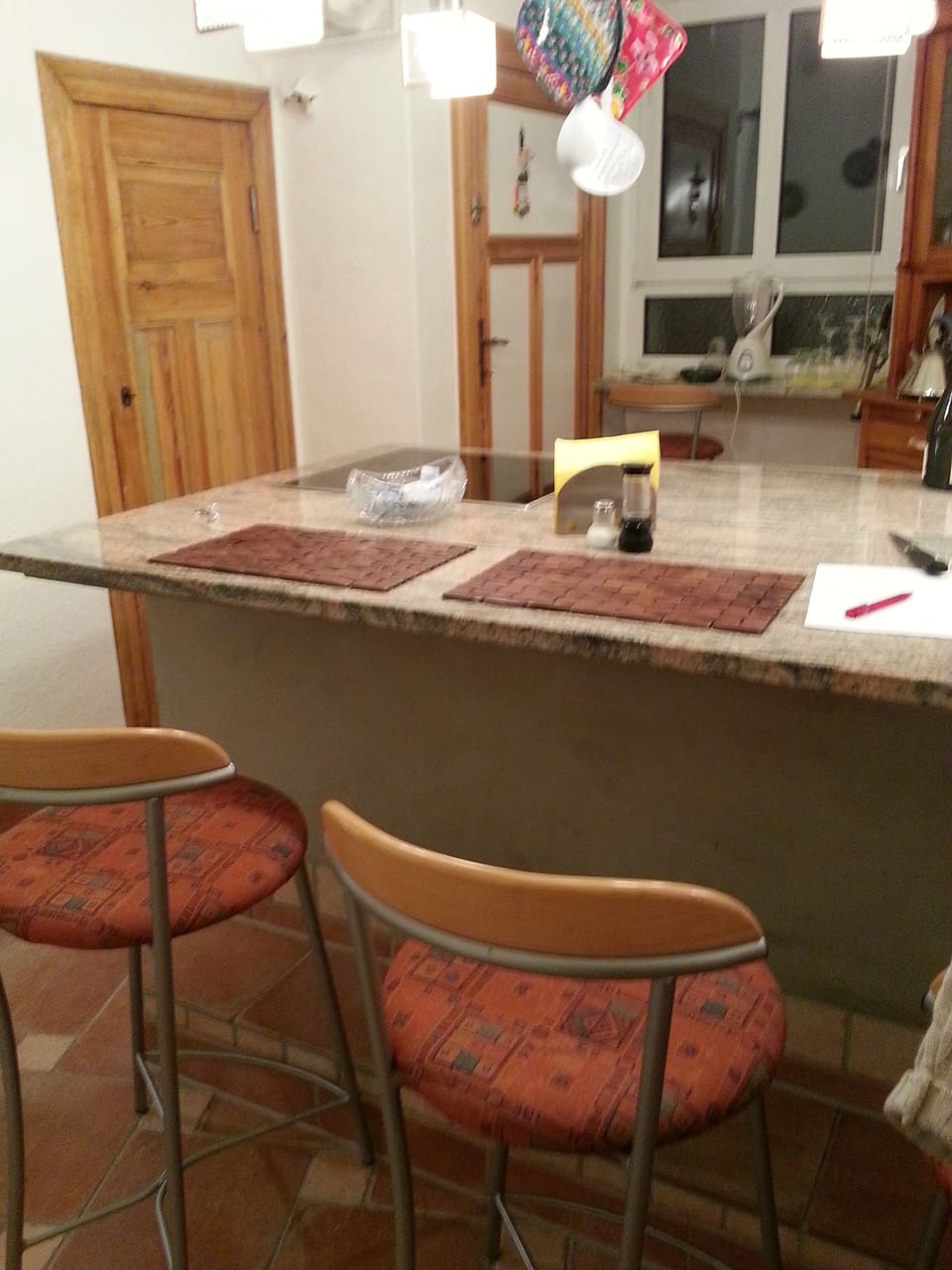 cooktop and kitchen island seating 4
