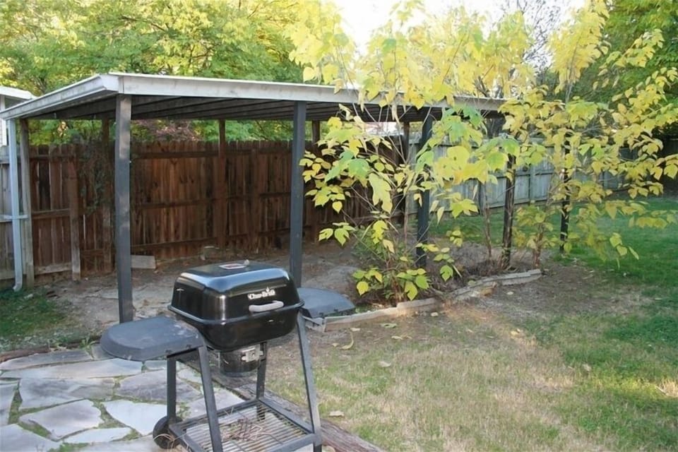 Large fenced back yard, covered parking behind gate if needed.
