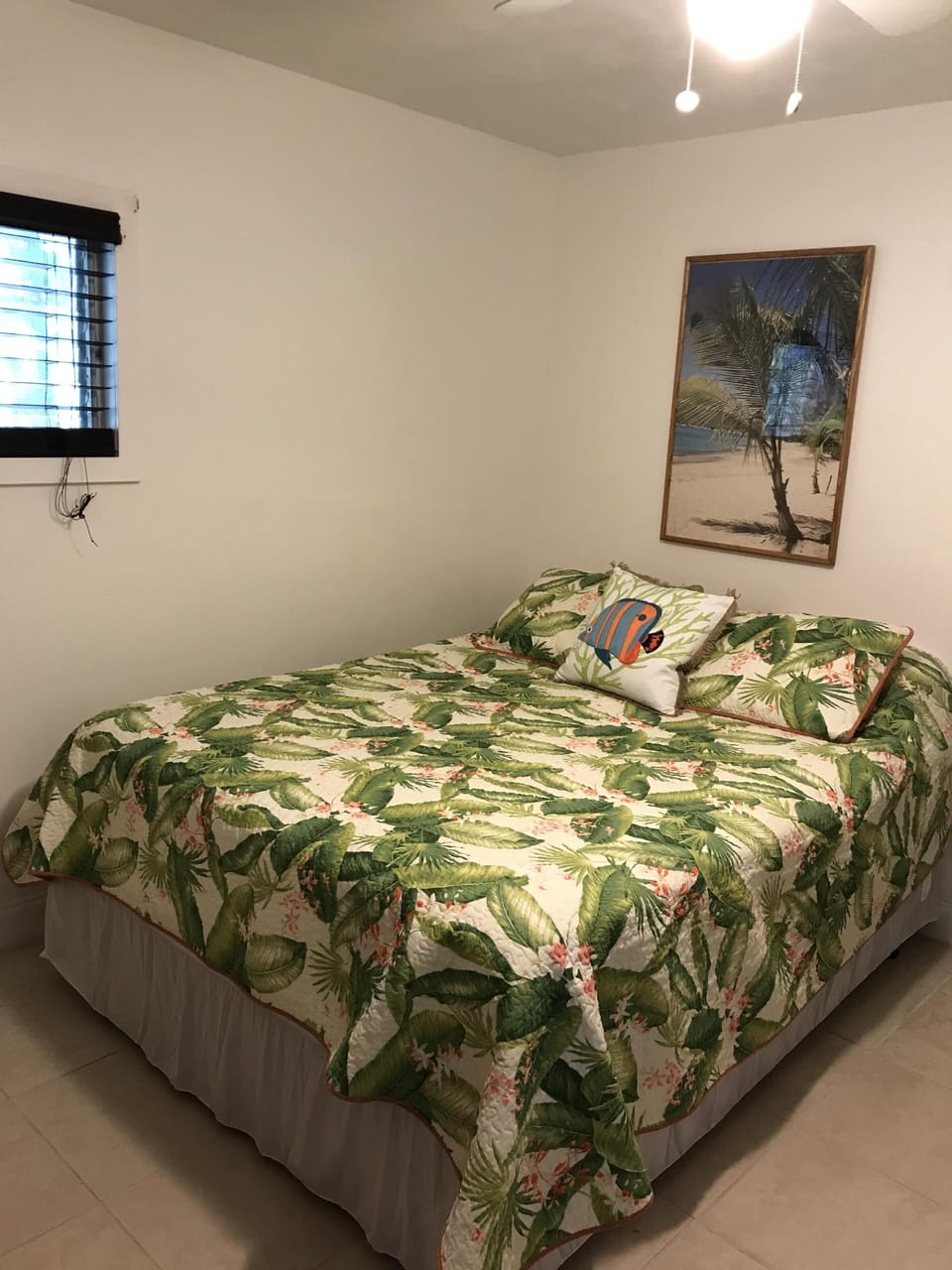 Bedroom with closet, dresser and chest of drawers