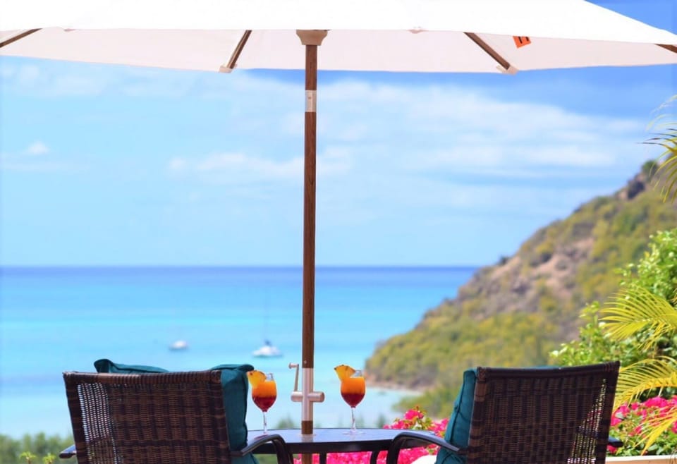 A perfect spot for two overlooking the Caribbean Sea.
