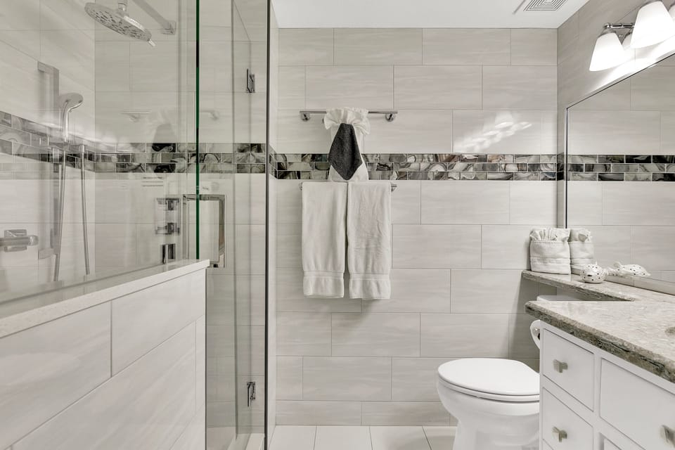 Master bath with rain head and hand held showers