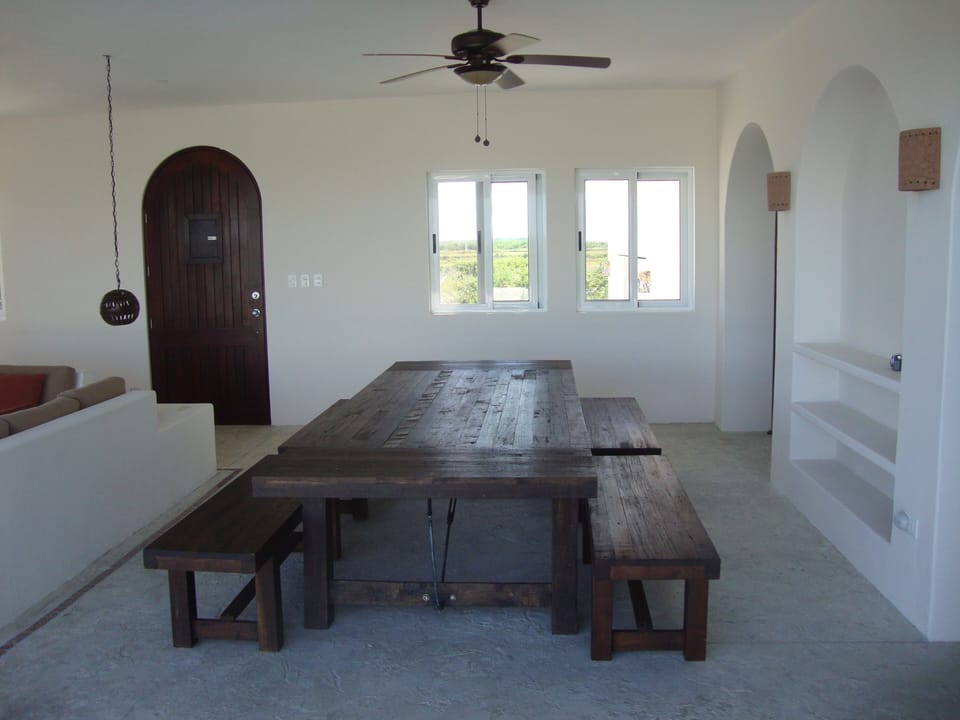 Large hardwood dining table that seats 14
