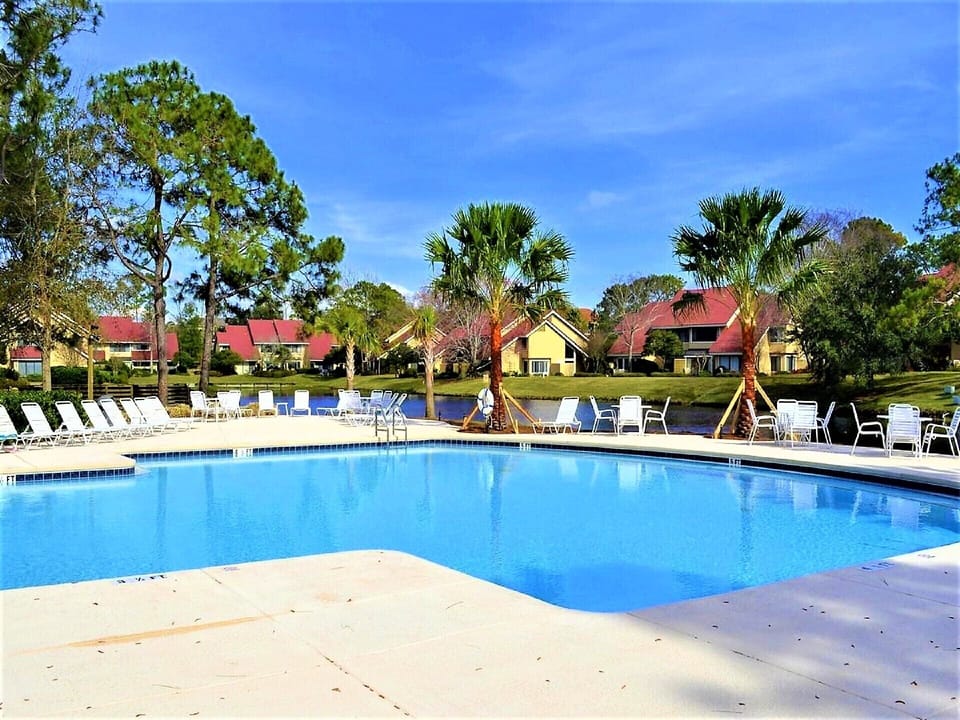 Relax at the community pool.. 1 minute ride in your complimentary golf cart