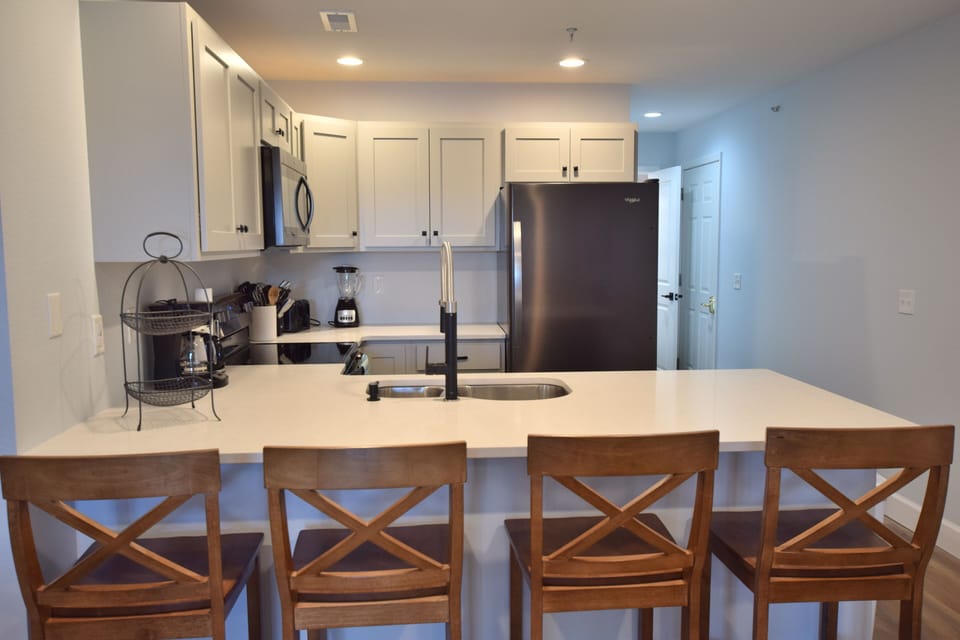 New kitchen with quartz counter tops and new appliances