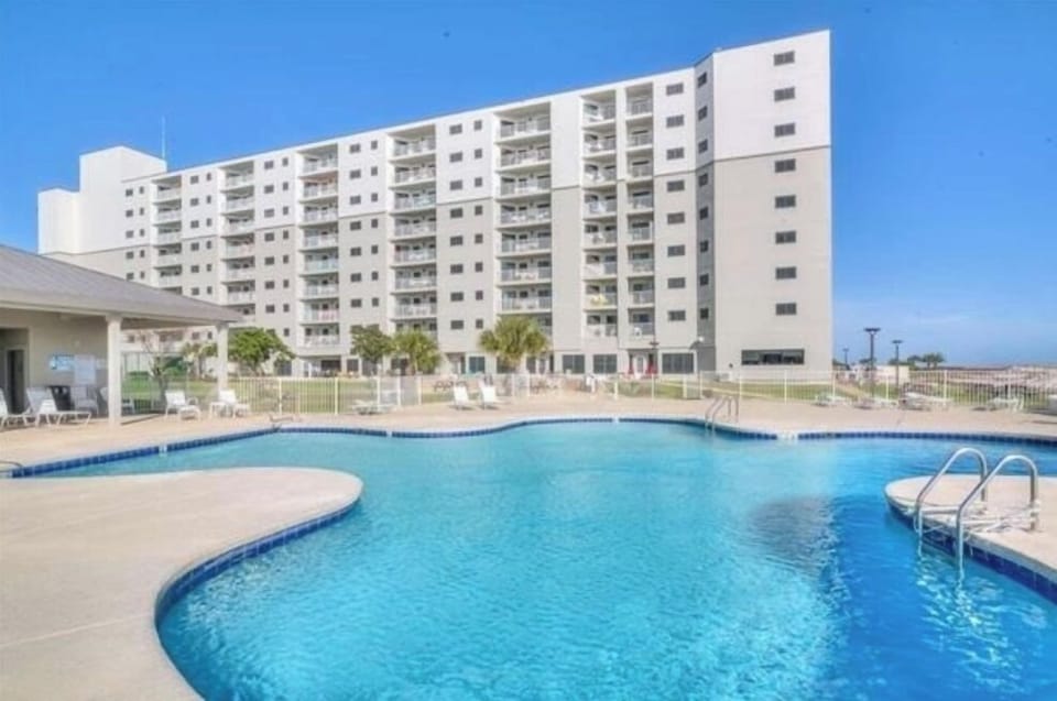 Pool conveniently located just steps from the condo and beach access. 