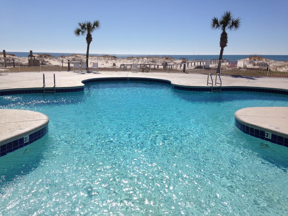 Enjoy resort-style pools with beautiful Gulf Views just steps from the beach