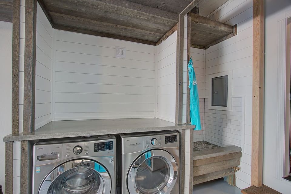 "Single stall garage with a 2nd LG washer/dryer combo."