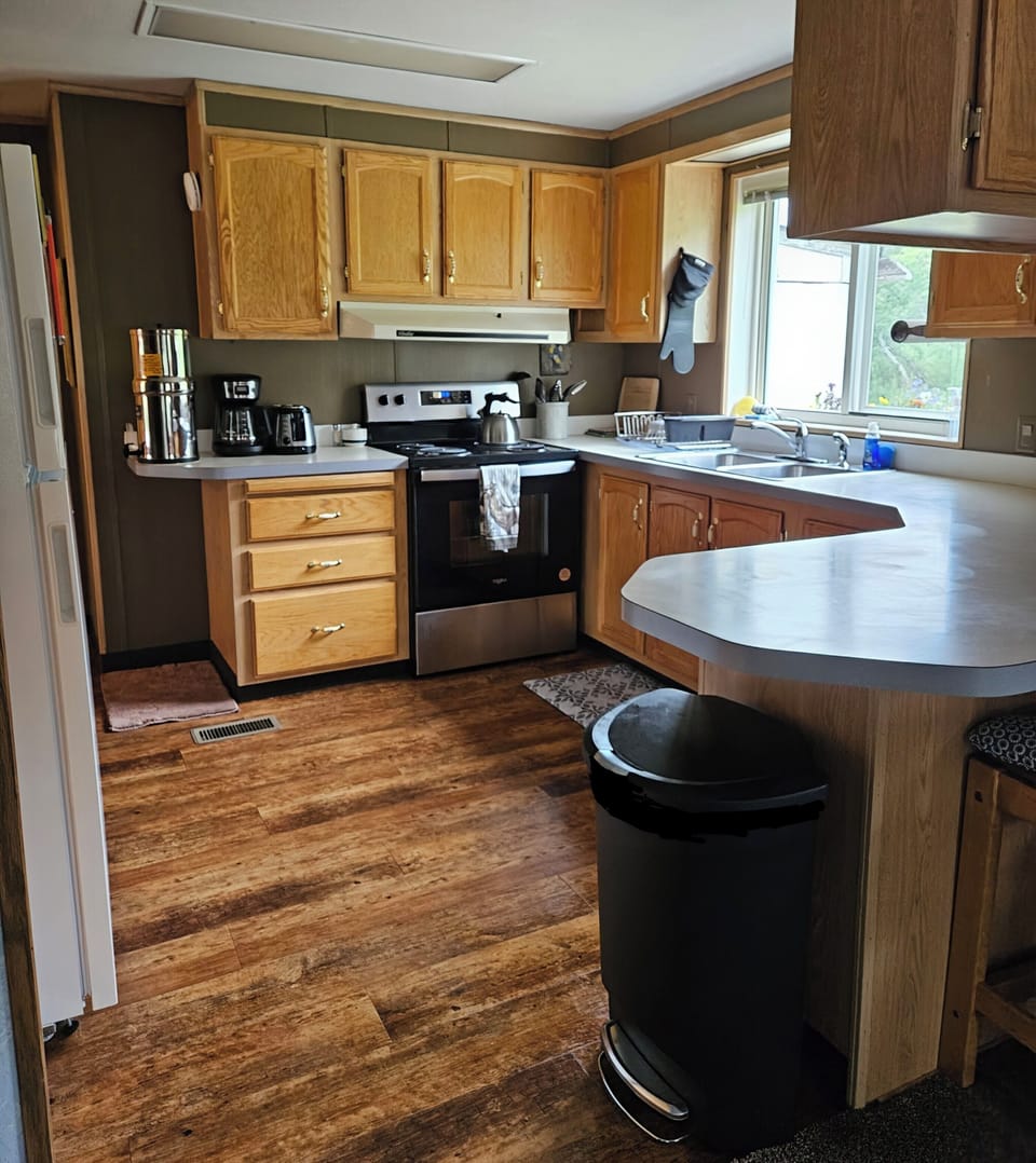 Kitchen is stocked w/a selection of oils, vinegar, spices, teas and coffee, etc.