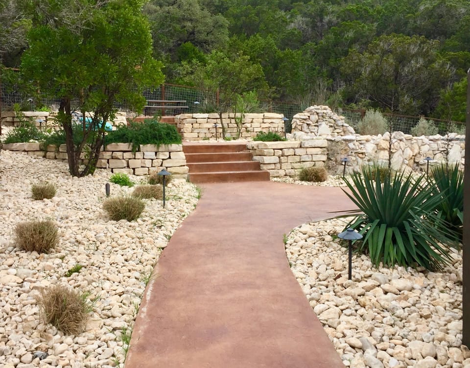 Kickin Back - Beautiful paths to 3 levels of poolside relaxation areas.