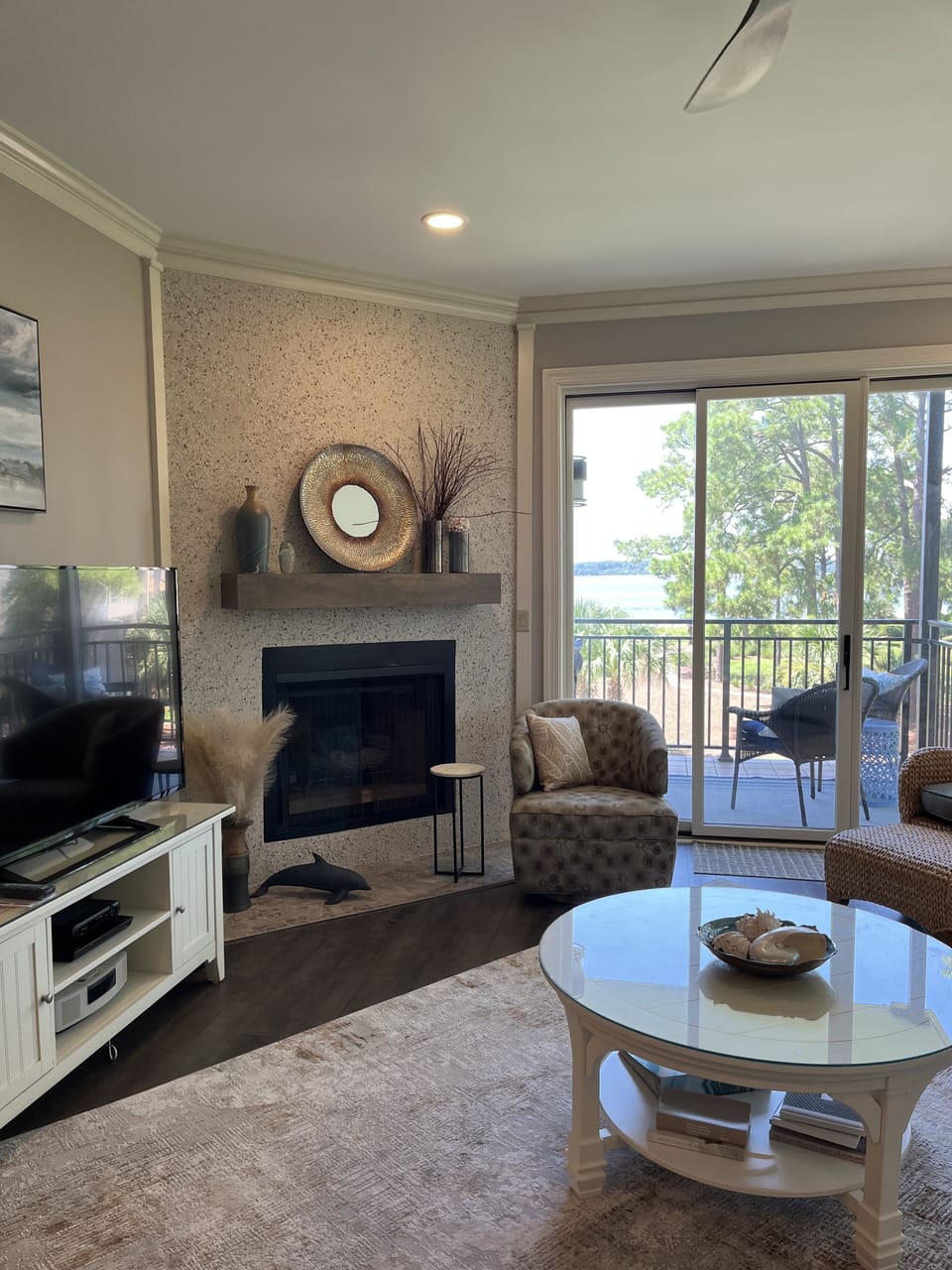 One of a kind tabby oyster shell fireplace surround.  Stunning view from living 