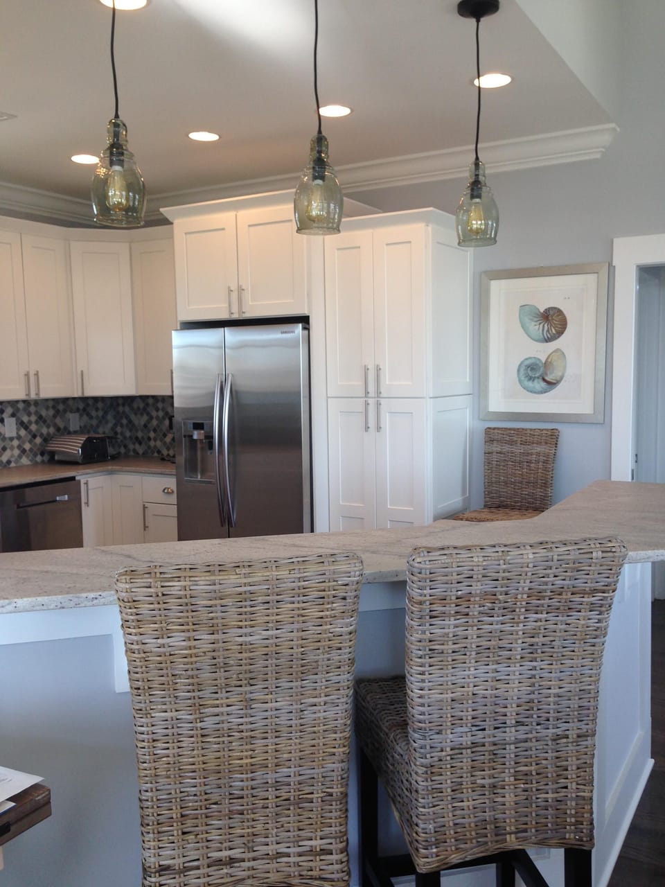 Large Counter Bar top with  three stools.