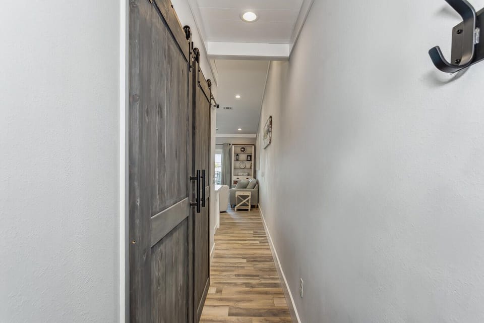 Hallway Leading to the Living Room and Kitchen