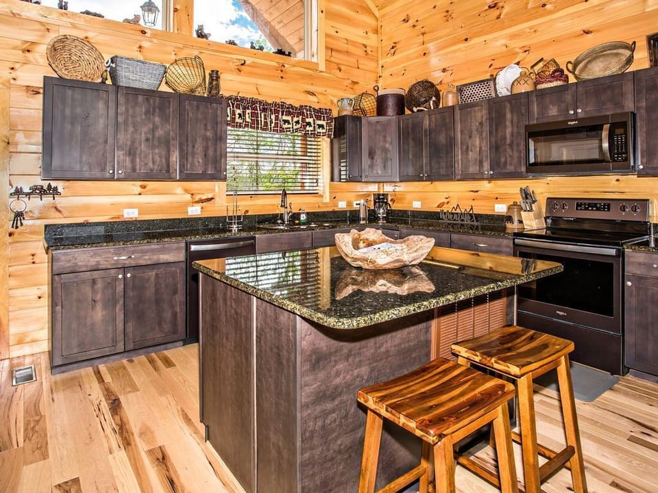 Kitchen bar/island has seating as well.