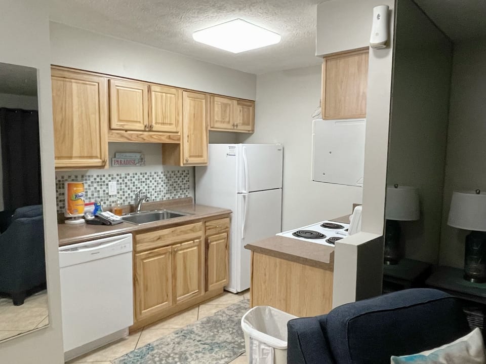 Full size kitchen with all appliances including microwave.  