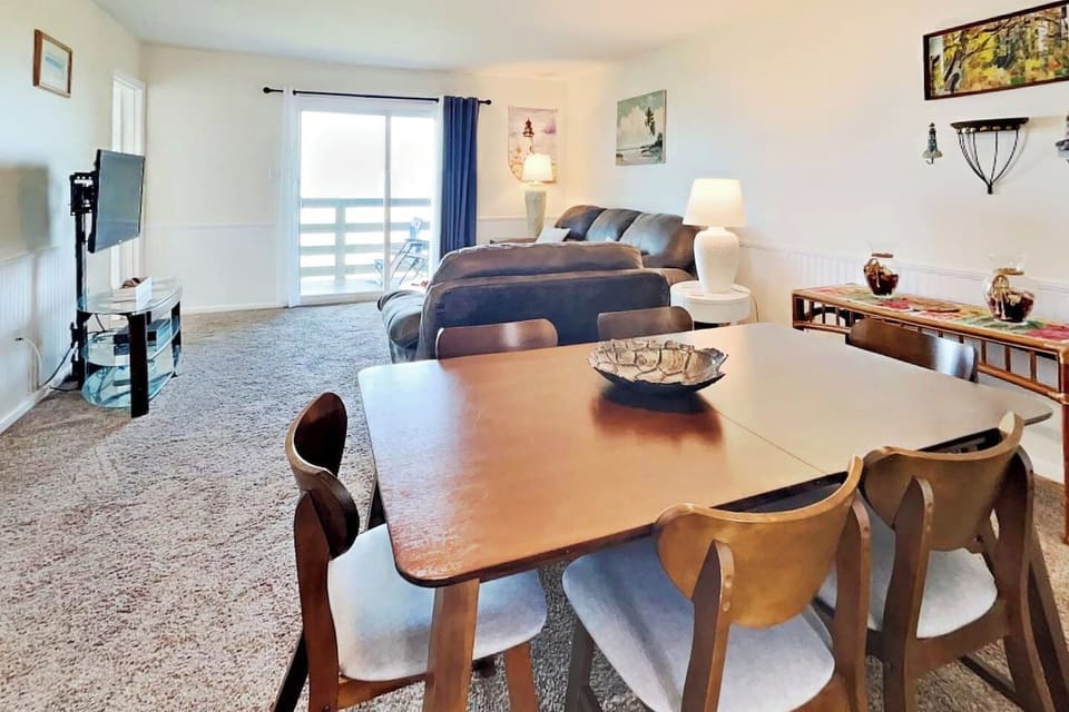 The table measures 59" long to seat six people around it comfortably. 