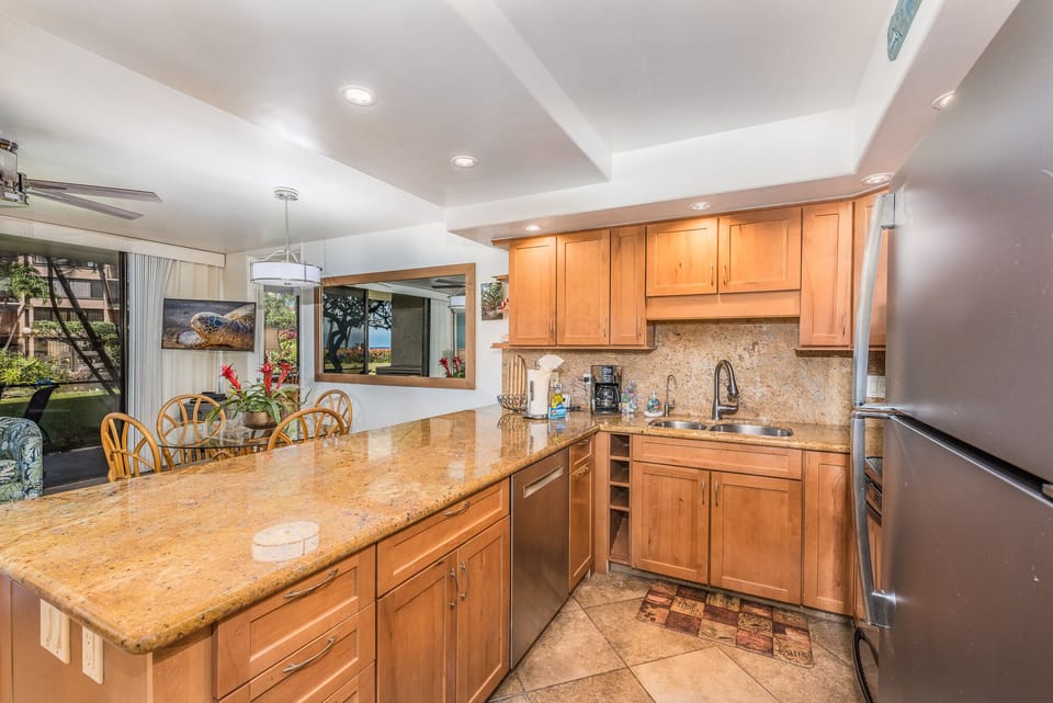 Granite Countertops, Custom Cabinets, and Full-size Stainless-steel Appliances