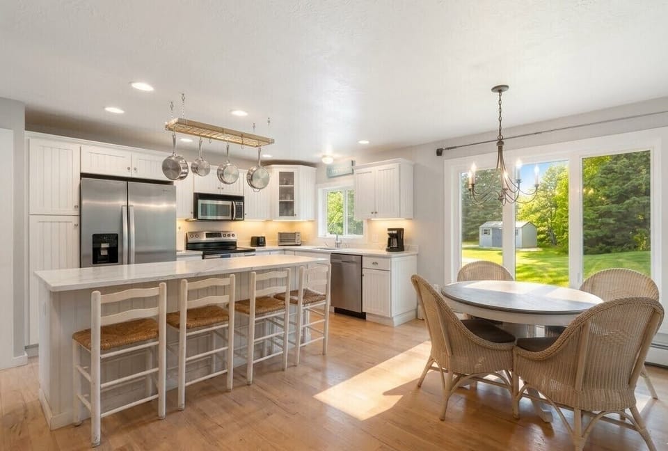 Large and open eat in kitchen with dining new stone counters updated in 2026