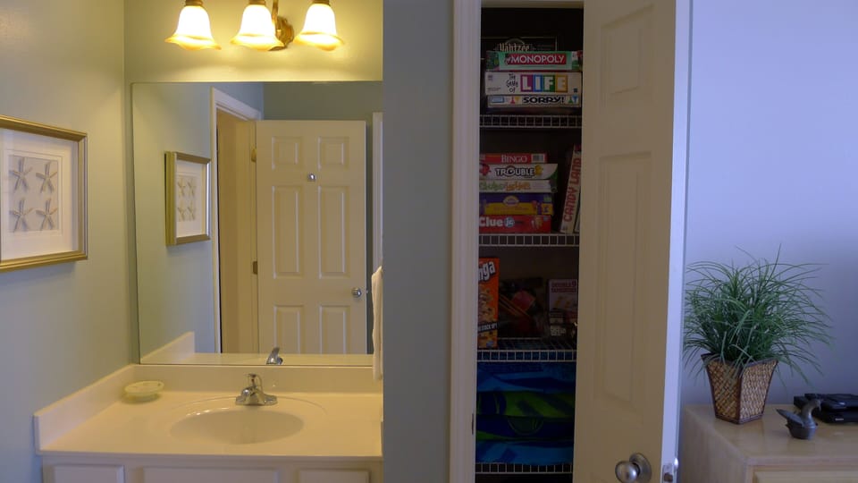 2nd Vanity in Master Bedroom, Closet full of books, board games, beach towels!