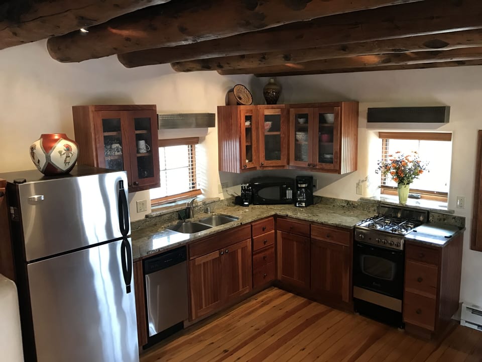 Kitchen opens to living area