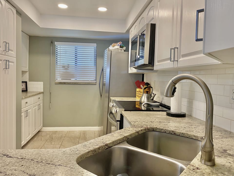 Granite countertops, window to front door